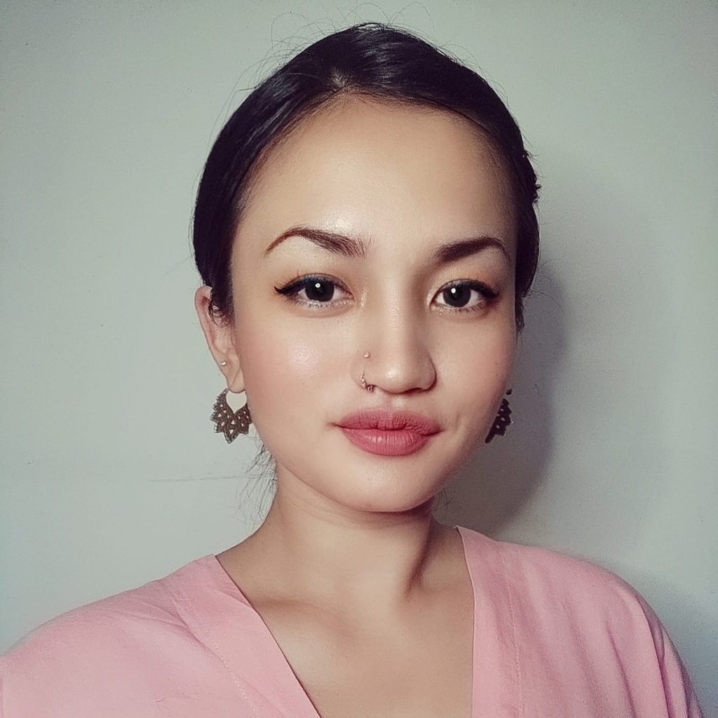 Ivy Aulia, Founder and Creator of Mind Modes®, smiling in a professional portrait